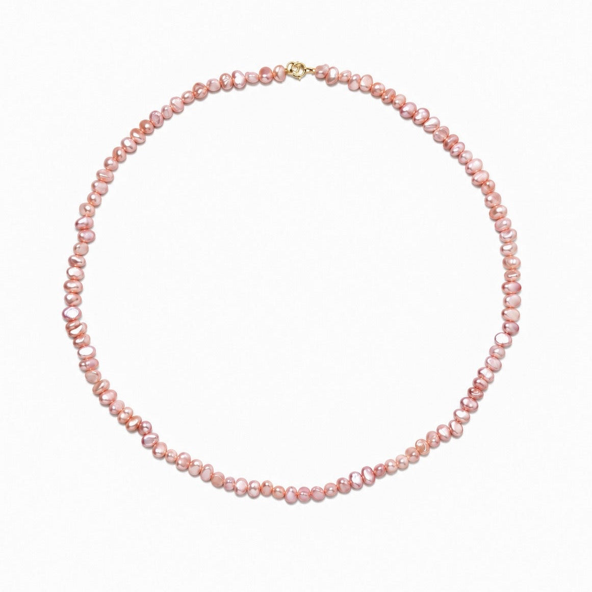 A delicate necklace made of small, irregular light pink freshwater pearls with a small gold clasp, displayed on a clean white background.
