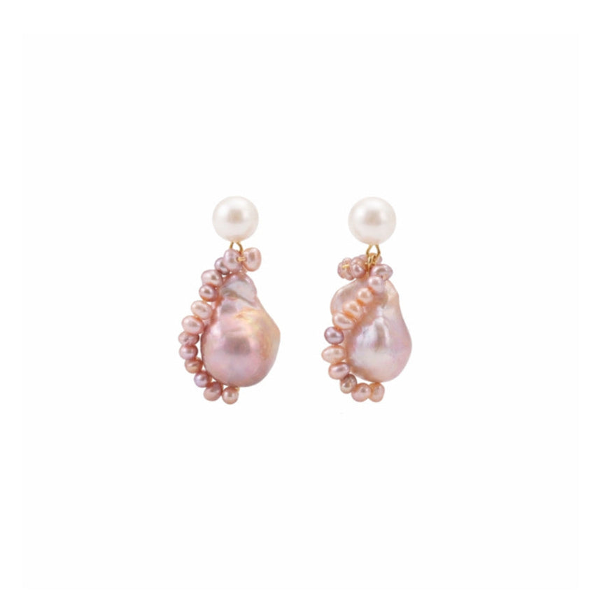 A pair of pearl earrings featuring a white round pearl stud with a teardrop baroque pearl below with spiralling small round pearls around it. The pearls in dangling part are in pinkish purple tone.