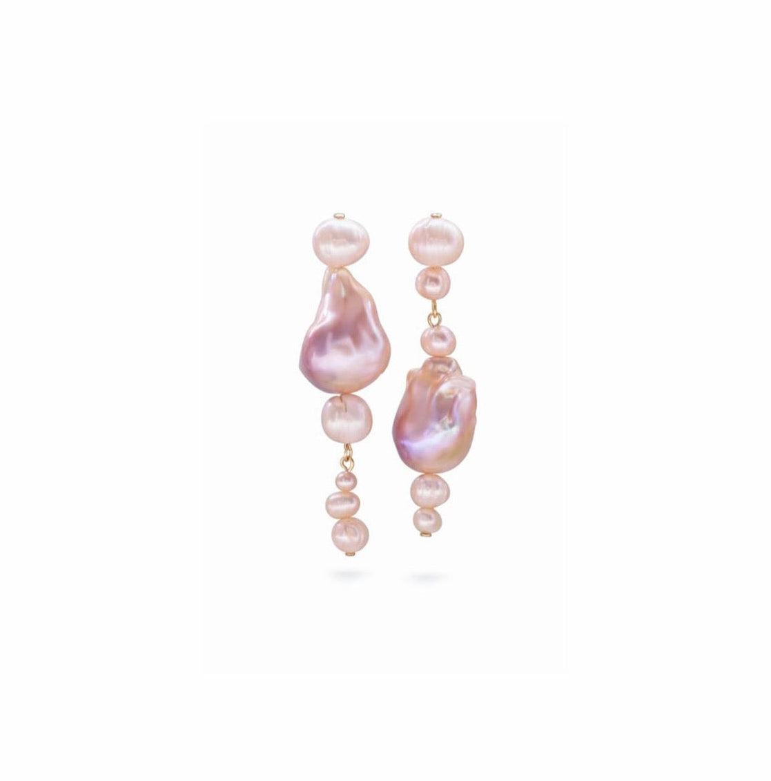 A pair of gold drop earrings featuring baroque pearls in soft pink and iridescent lavender tones, set against a solid white background.