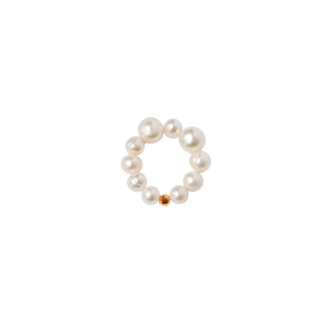 A ring made of freshwater pearls arranged in a circle with a small gold accent bead at the bottom center, shown on a plain white background.