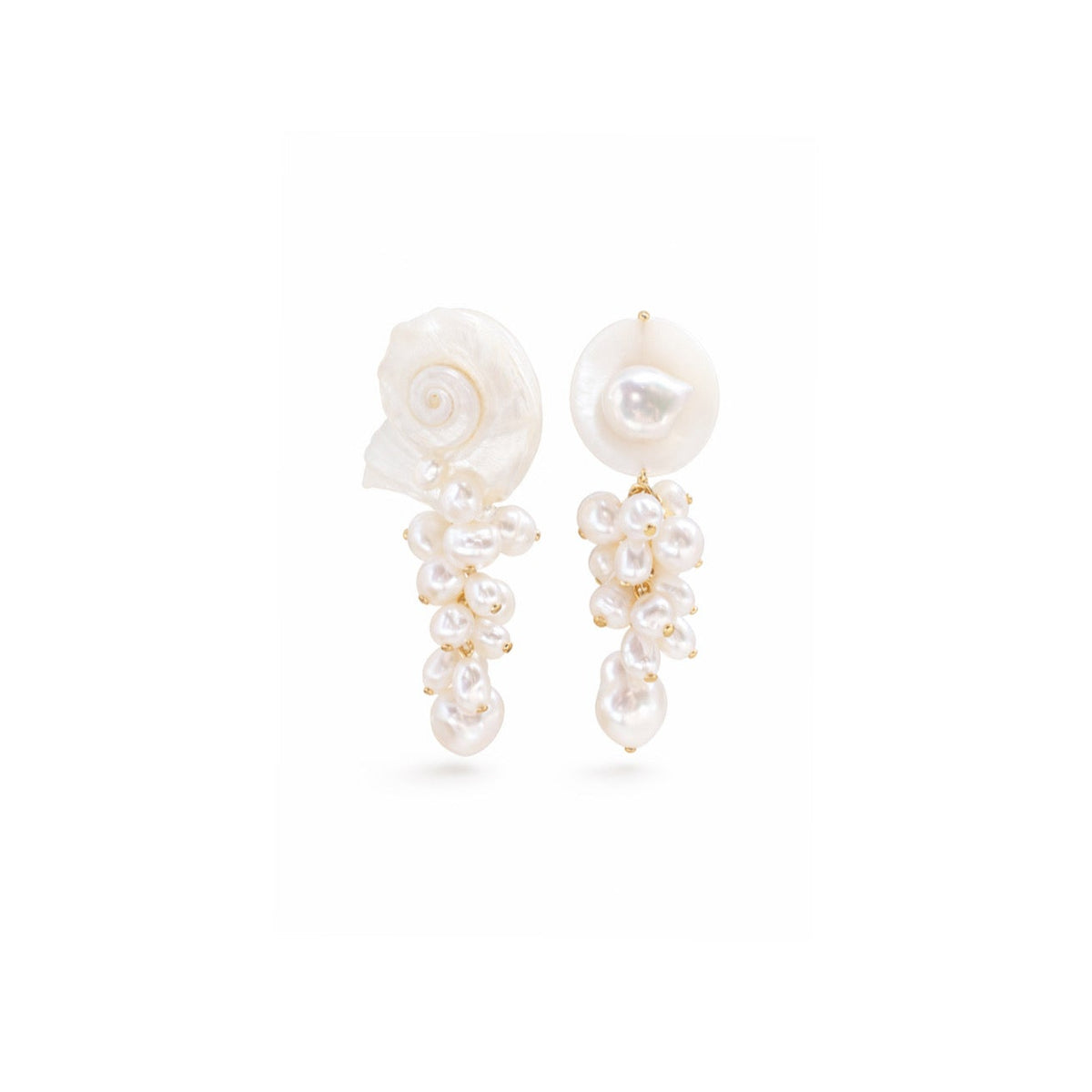 A pair of white shell and pearl drop earrings with gold-tone settings, displayed against a solid white background.