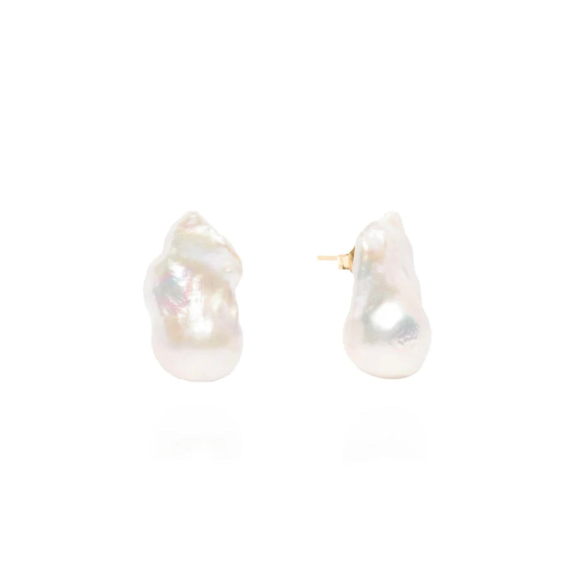 A pair of organic-shaped white baroque pearl stud earrings in plain white background. One side of the pair is showing the side which features a gold post. 