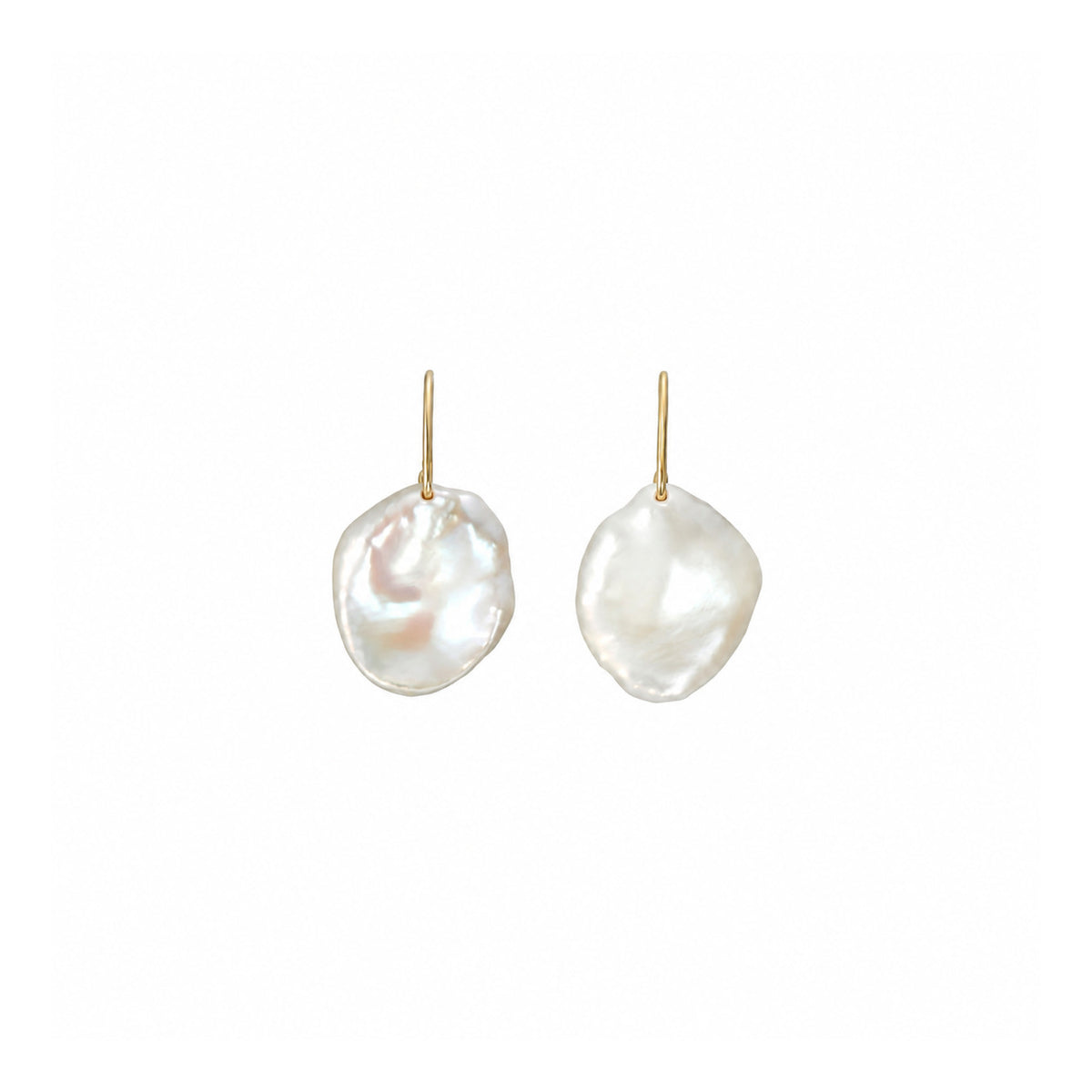 A pair of gold hoop earrings with irregular, organic-shaped white baroque pearls hanging from them, set against a plain white background.