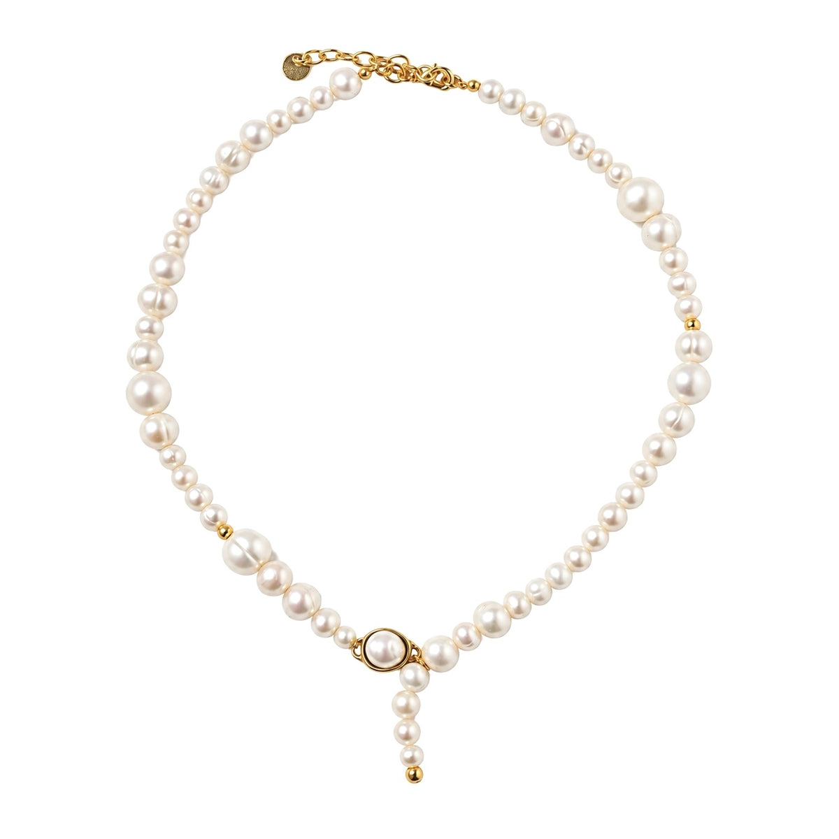 A pearl necklace with irregular white pearls and gold-tone metal accents, including a central oval connector and a small drop pendant, shown on a plain white background.