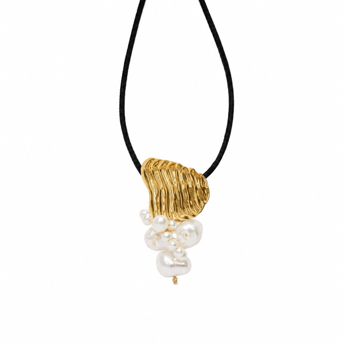 A gold pendant necklace with a cluster of white baroque pearls hanging from a black cord, shown against a plain white background.